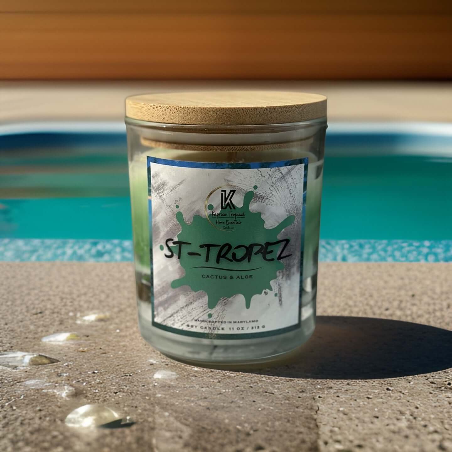 ST TROPEZ scented candle in elegant glass jar with tropical fragrance