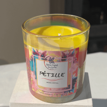 Top view of PETILLE candle with soft flame and refined fragrance
