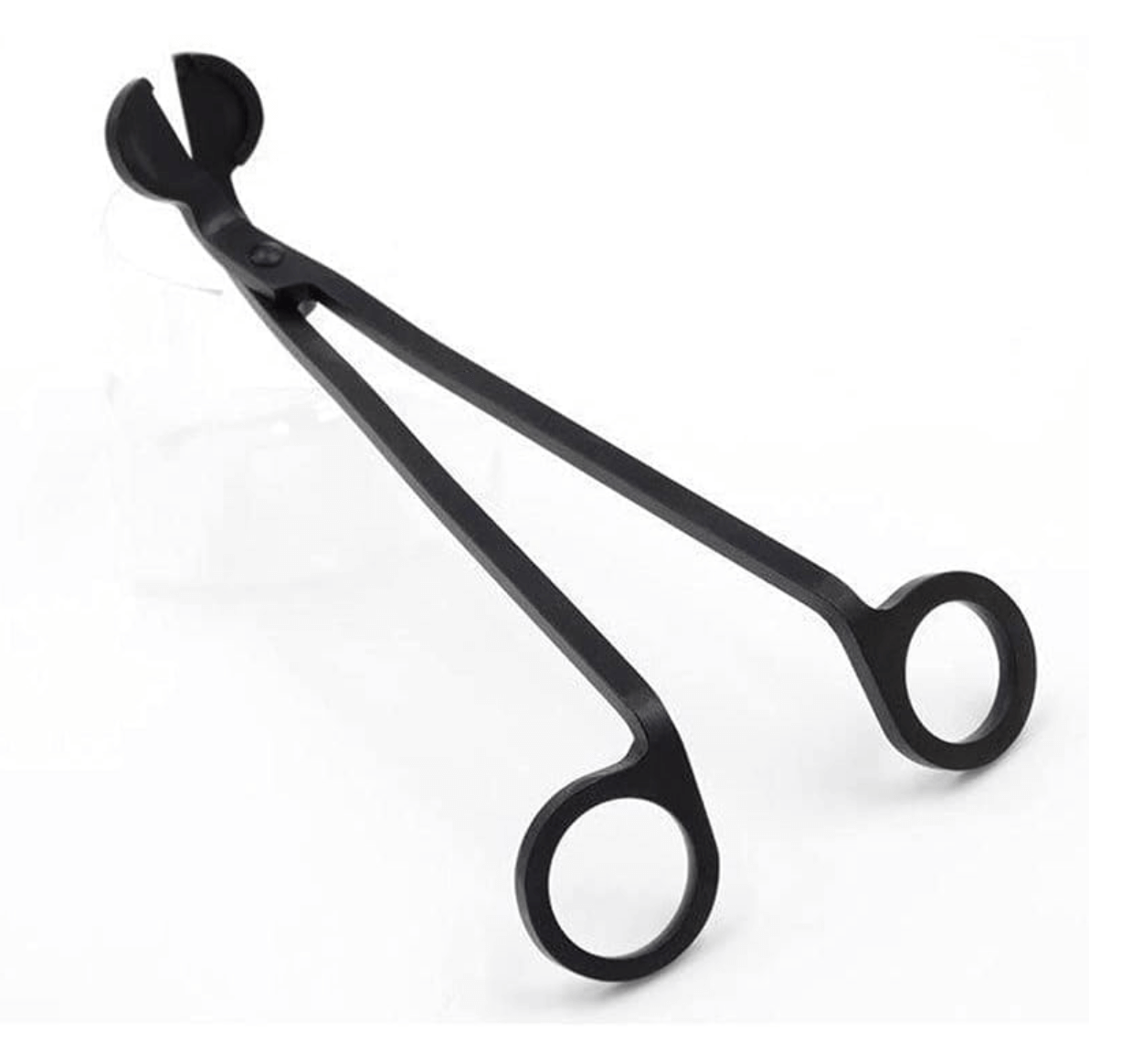 Close-up of KAPRICE TROPICAL CANDLE CO. wick trimmer in sleek design